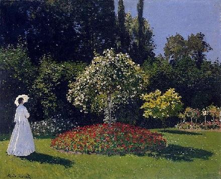 Mulher de branco no jardim